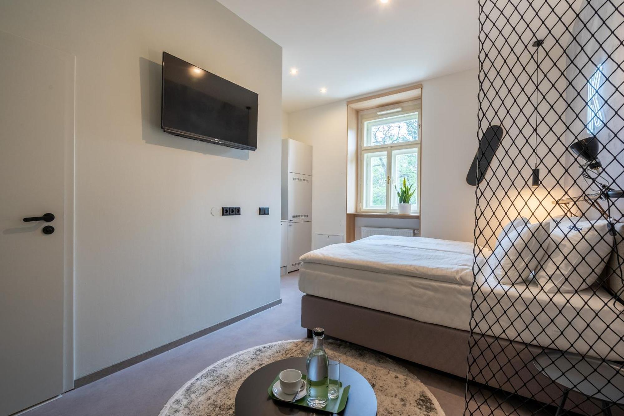 Honest Karlin Aparthotel Прага Стая снимка